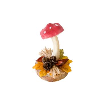 Un grand champignon rouge à pois blanc sur un socle d'automne | jourdefete.com