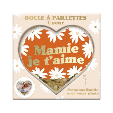 Boule à paillettes en forme de cœur "Mamie je t’aime" avec un fond floral et des paillettes dorées | jourdefete.com