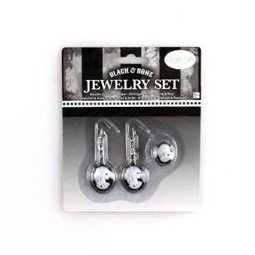 Ensemble bague et boucles d'oreille camée crâne