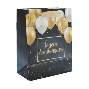 Sac cadeau Joyeux Anniversaire noir avec ballons dorés et blancs sur fond étoilé | jourdefete.com