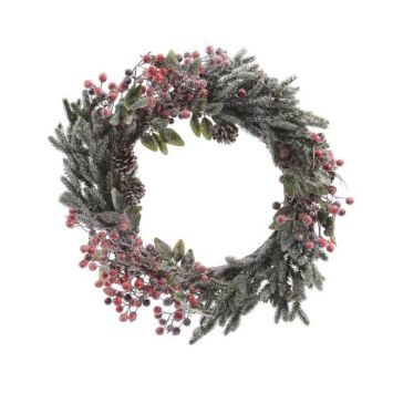 couronne de baies rouges et pommes de pin enneigée | jourdefete.com