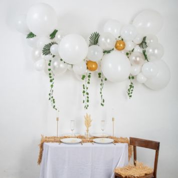 Kit arche 55 ballons et feuilles tropicales - Tropichic