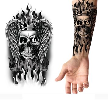 Tatouage temporaire en forme de crâne en flamme avec couronne 14x30 cm | jourdefete.com