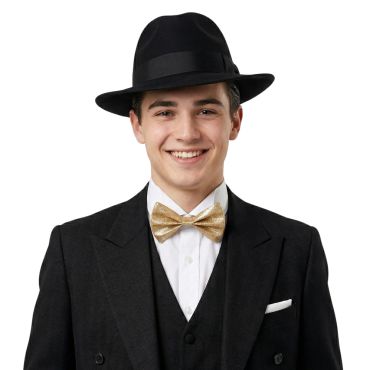 Jeune homme souriant qui porte un nœud papillon à paillettes dorées | jourdefete.com