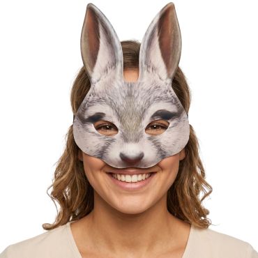 Jeune femme blonde souriante portant un masque de lapin aux grandes oreilles | jourdefete.com Jeune femme blonde souriante portant un masque de lapin aux grandes oreilles | jourdefete.com