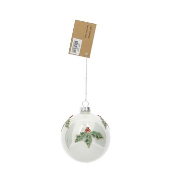 Boule de Noël en verre décorée de feuilles de houx et baies rouges | jourdefete.com
