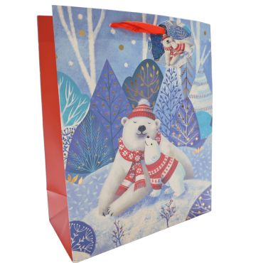 Sac cadeau de Noël Ours Polaire avec motifs hivernaux et couleurs festives | jourdefete.com Sac cadeau de Noël Ours Polaire avec motifs hivernaux et couleurs festives | jourdefete.com